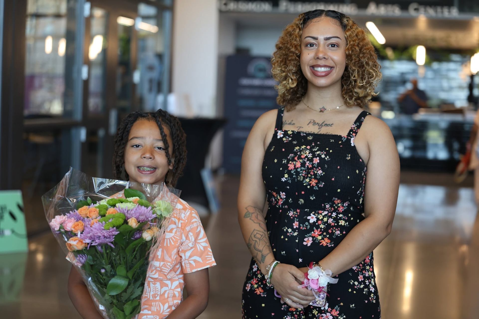 Mother and son with flowers