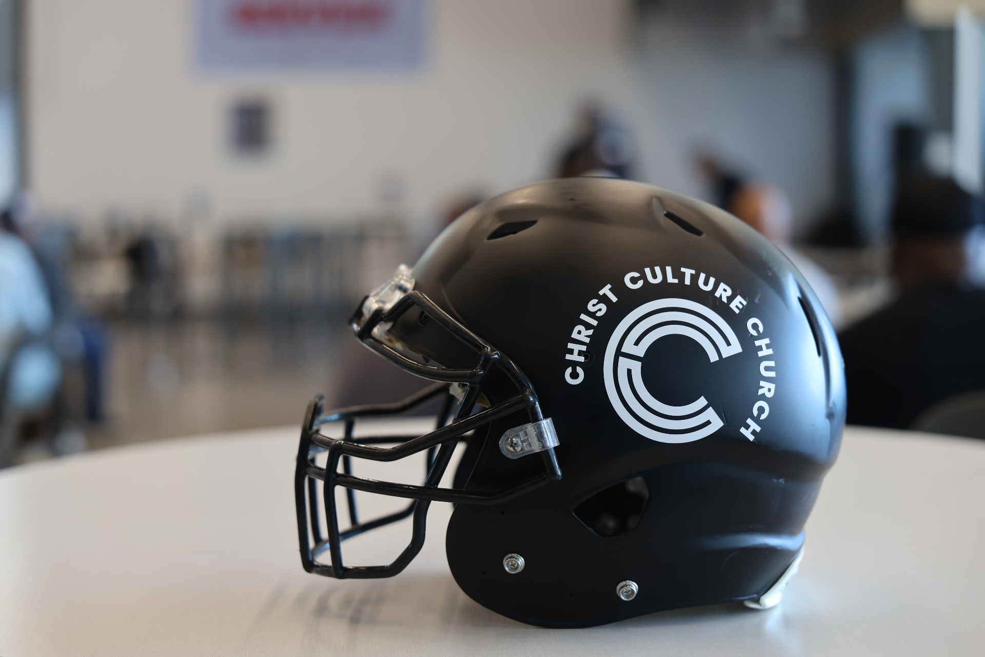 Christ Culture Church branded football helmet