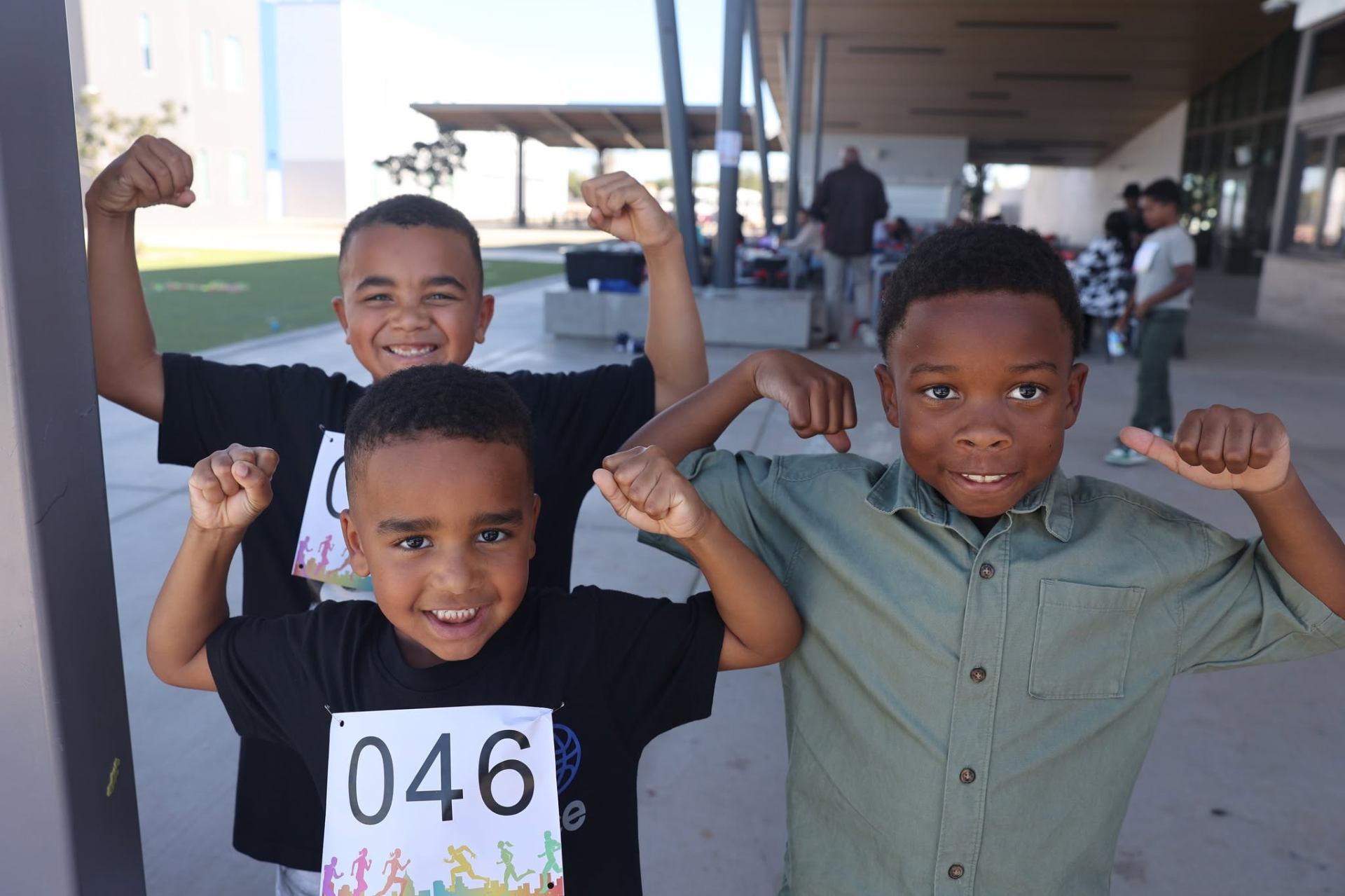 Kids flexing at the Harvest Festival